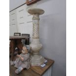 An alabaster column plant stand