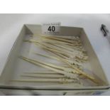 26 ivory cocktail sticks,