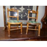 A pair of children's chairs