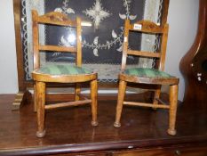A pair of children's chairs