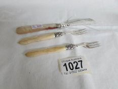 A silver butter knife, J C Birmingham 1892 and 2 silver pickle forks, Birmingham hall mark,