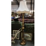 A good 'Giltwood' standard lamp with shade