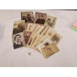 A box containing approximately 60 'Cartes Des Visites' photographs