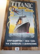 A painted sign of the Titanic on pine boards