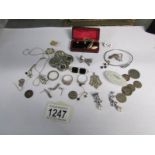 A mixed lot of silver and other items including pre 1947 coins, brooches,bangle,