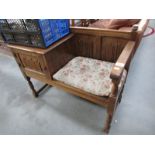 An oak telephone seat