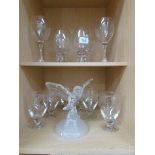 A glass owl and a quantity of drinking glasses