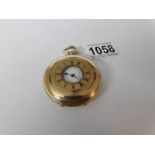 A gold plated half hunter pocket watch