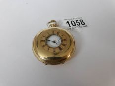 A gold plated half hunter pocket watch