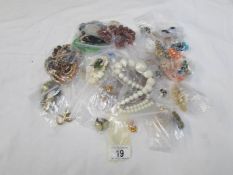 A mixed lot of costume jewellery including necklaces and earrings