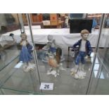 A pair of blue and white continental porcelain figures,