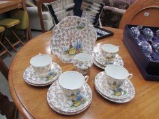 14 pieces of crinoline lady tea ware