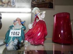 A Royal Doulton 'Autumn Breeze' figurine and a second quality 'Twilight' figure