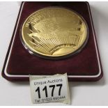 A large plated Liberty $20 coin