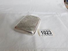 A silver cigarette case hall marked Birmingham 1922