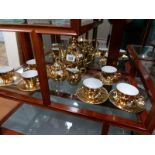 A gilded coffee set
