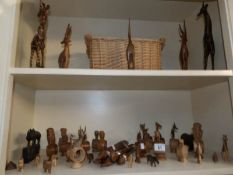 A quantity of wooden animal figures