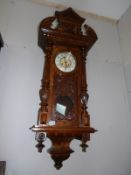 A large carved wall clock,