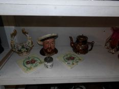 A Henry VIII jut, A Toby Jug, teapot,