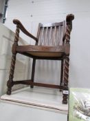 An oak elbow chair