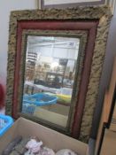 A gilt framed mirror, frame a.