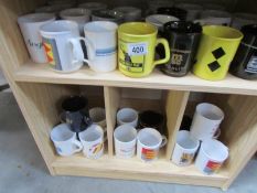 A large quantity of mugs