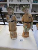 A pair of continental bisque figurines