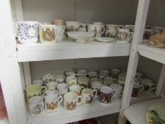 A large quantity of commemorative mugs including Falklands