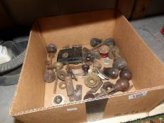 A box of old door knobs etc