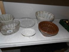 5 Victorian jelly moulds and a glass plate