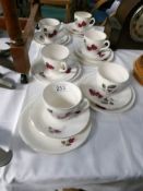 An 18 piece rose decorated tea set