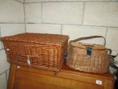 A picnic basket and a fishing creel