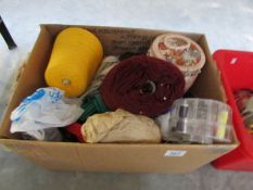 A box of knitting wool etc