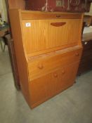 A teak bureau