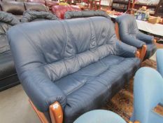 A blue leather sofa and chair