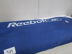 A Reebok exercise mat