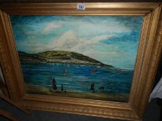 A gilt framed oil on board beach scene,