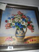 A mid 20th century oil on canvas still life with flowers in jug, signed F Laurence,