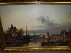 A gilt framed harbour scene,