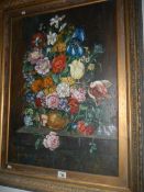 A gilt framed oil on canvas 'Floral Study' signed E De Maurice