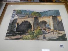 A good framed and glazed watercolour of Llangollen signed Spencer Ford,