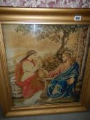 A framed and glazed religious tapestry,