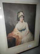 A framed and glazed portrait print, signed but indistinct,