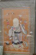 A large framed and glazed Japanese embroidery,