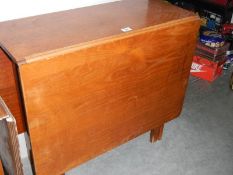 A mahogany gate leg table