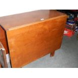 A mahogany gate leg table