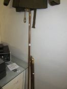 2 brass head walking sticks and a novelty pool cue stick