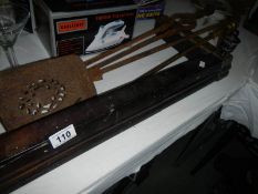 A Victorian fender and a set of Victorian fire irons