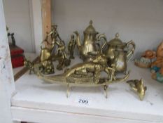 A brass tea/coffee set and a collection of other brass items