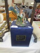 A boxed bronze art gallery fairy figurine